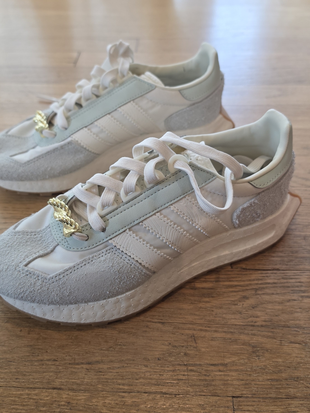 Adidas Retropy E5 in the "White Linen Green" (HQ6962) Women’s Size 8